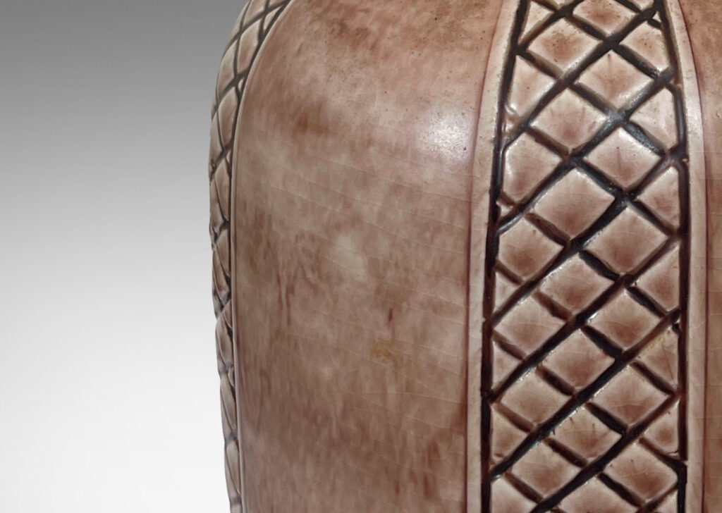 Gallery BAC drum forms ornamented with diamond lattice stripes, glazed in a light brown wash