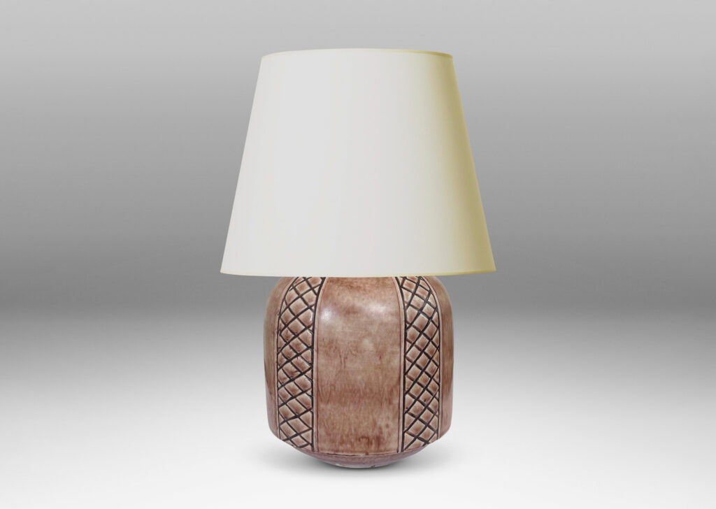 Gallery BAC drum forms ornamented with diamond lattice stripes, glazed in a light brown wash