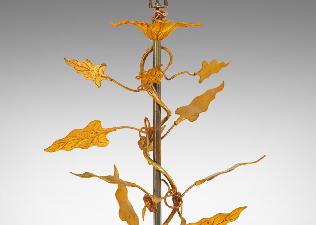 Gallery BAC two sockets to reflect light up from bowl, surrounded in entwined vine forms with lancet leaves and trumpet shaped flowers