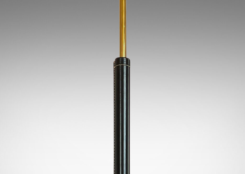 Gallery BAC stand and disk base covered in stitched black leather; brass, leather