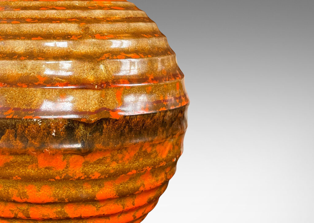 Gallery BAC horizontally fluted form glazed in a rich mottled orange-brown-gold glaze