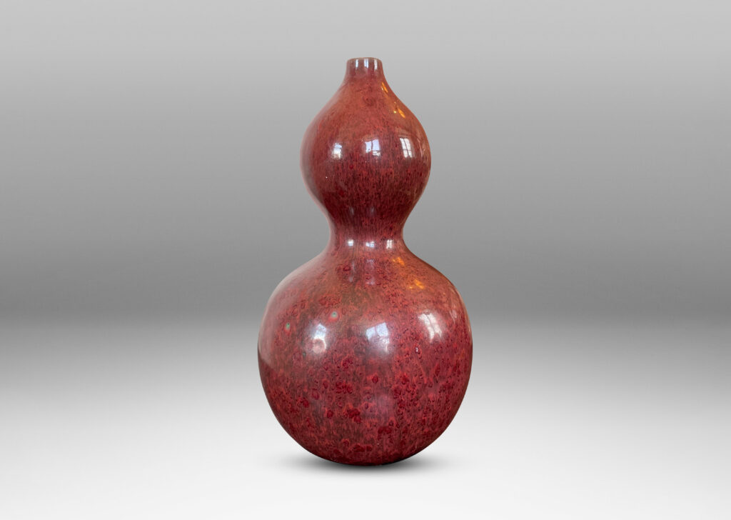 Gallery BAC sinuously modeled double gourd form in a rich burgundy oxblood glaze