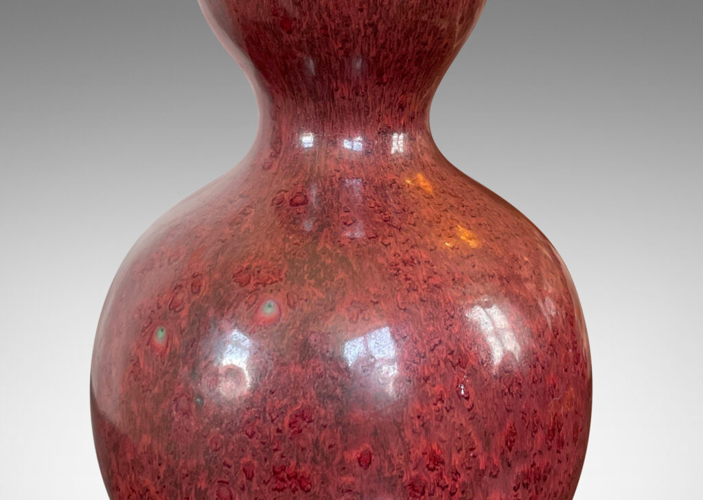 Gallery BAC sinuously modeled double gourd form in a rich burgundy oxblood glaze