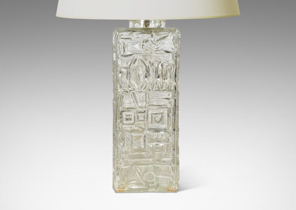 Gallery BAC square canister forms with various geometric designs in reliefs; clear mold-blown glass