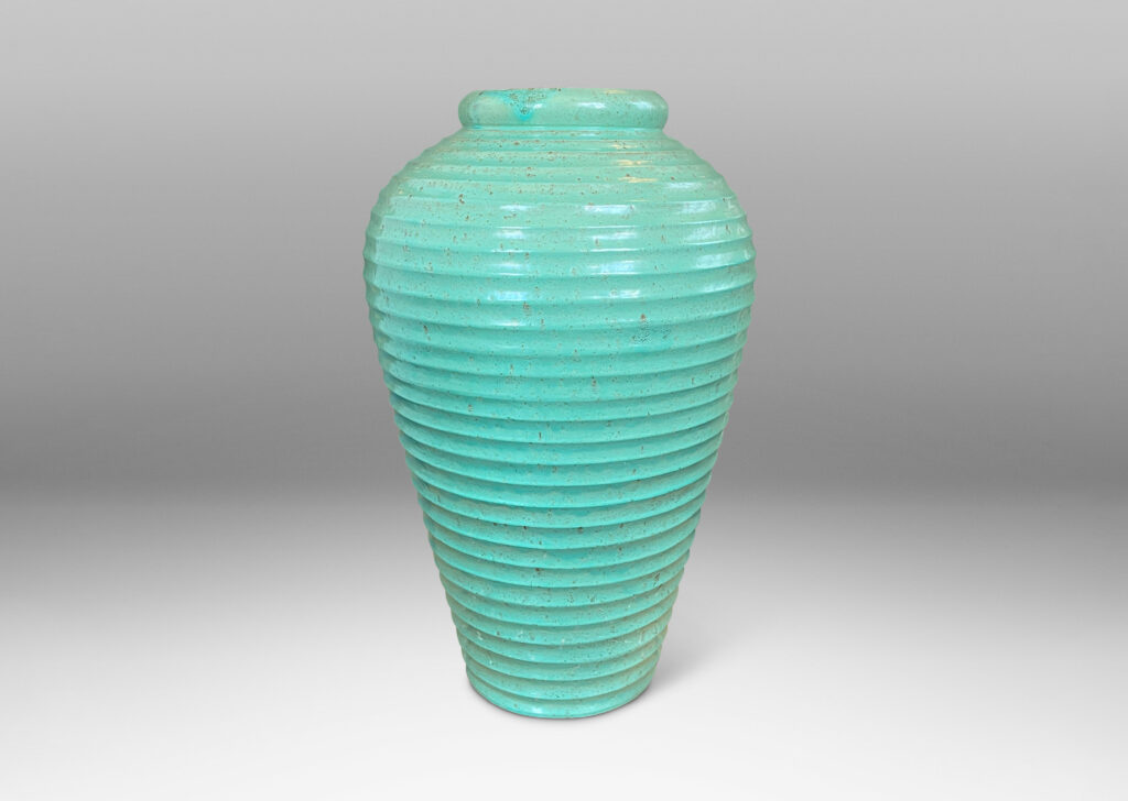 Gallery BAC elegant tapered form encircled in horizontal fluting and glazed in a bright celadon