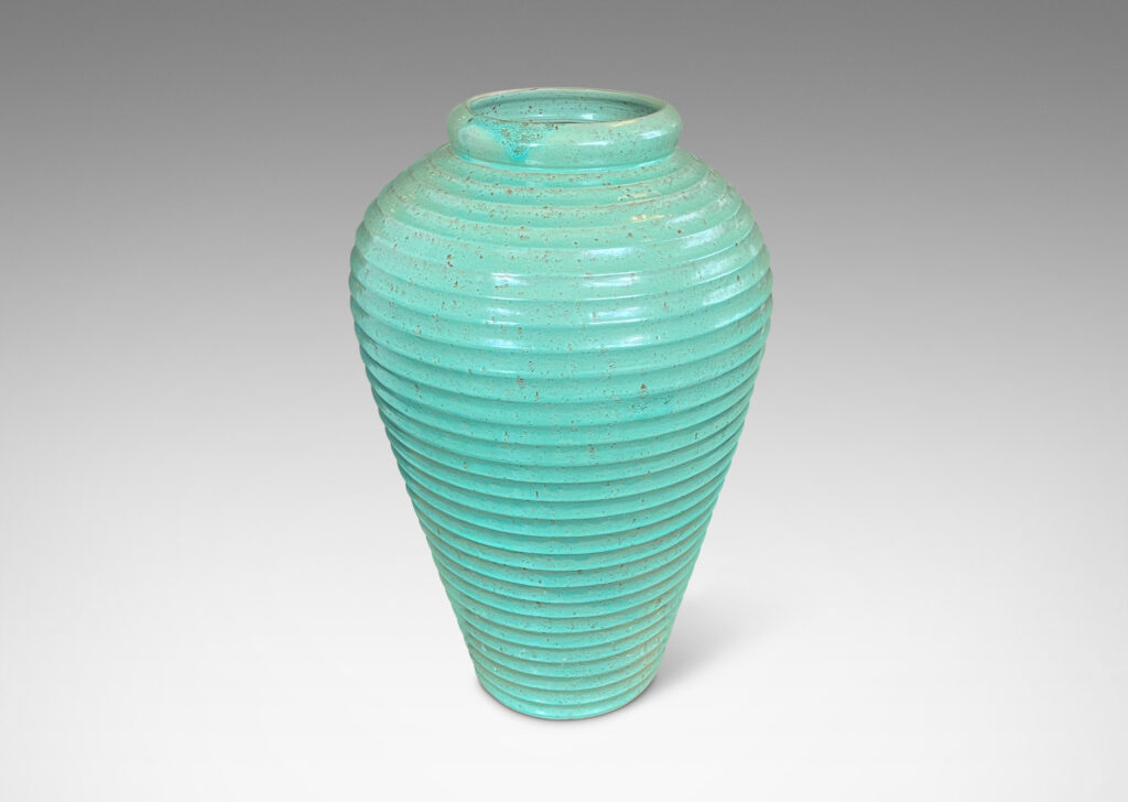 Gallery BAC elegant tapered form encircled in horizontal fluting and glazed in a bright celadon