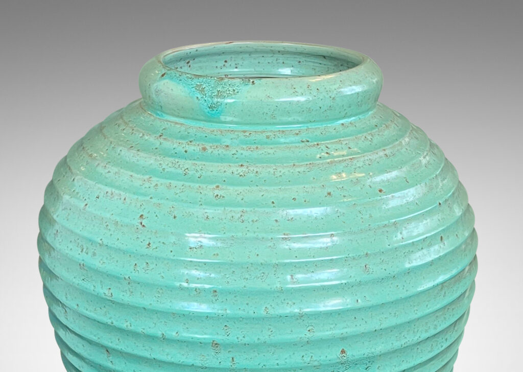 Gallery BAC elegant tapered form encircled in horizontal fluting and glazed in a bright celadon