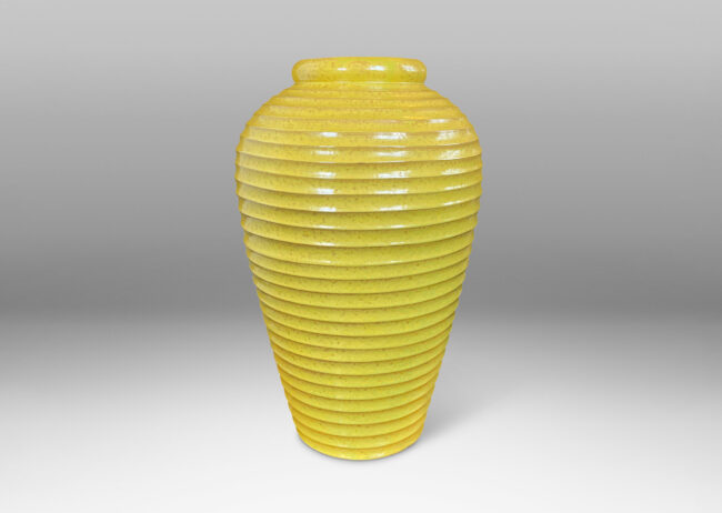 Gallery BAC elegant tapered form encircled in horizontal fluting and glazed a lemony yellow