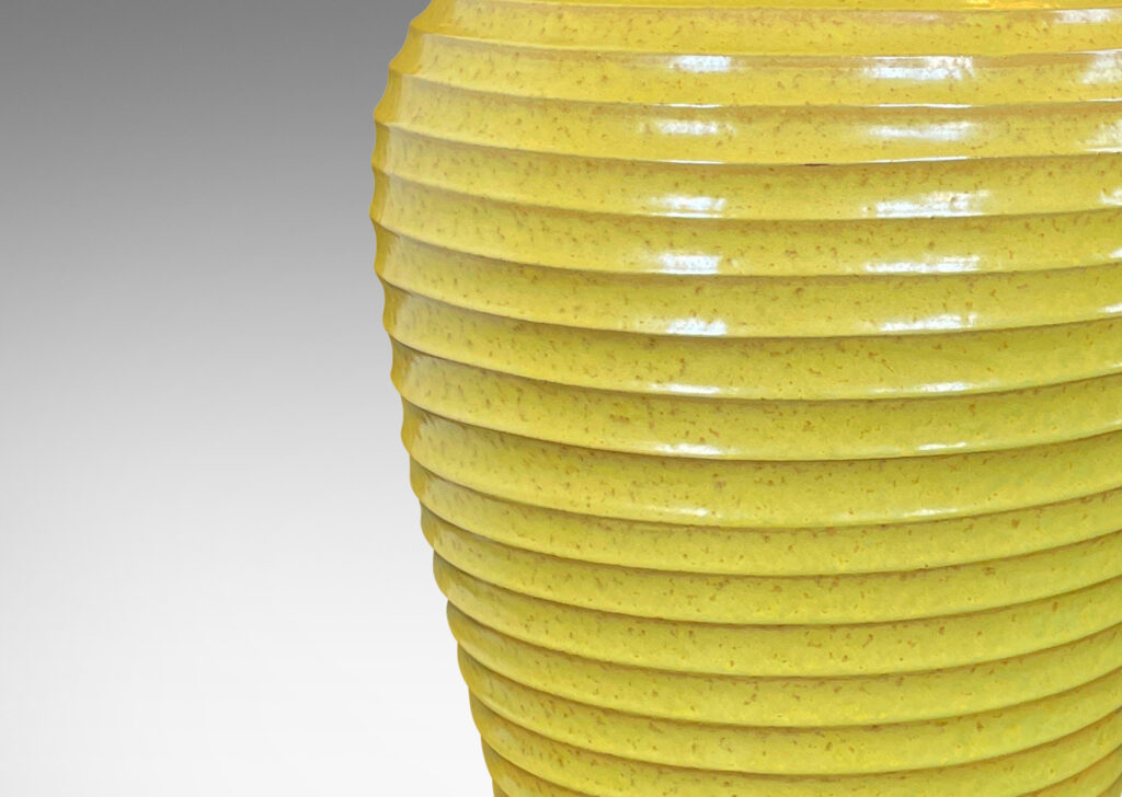 Gallery BAC elegant tapered form encircled in horizontal fluting and glazed a lemony yellow