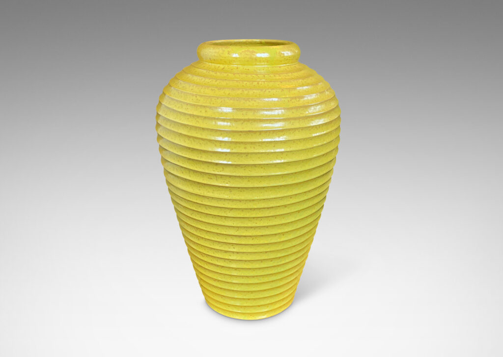 Gallery BAC elegant tapered form encircled in horizontal fluting and glazed a lemony yellow