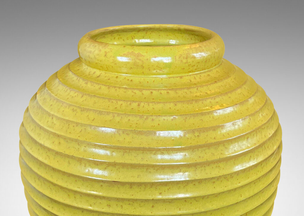 Gallery BAC elegant tapered form encircled in horizontal fluting and glazed a lemony yellow