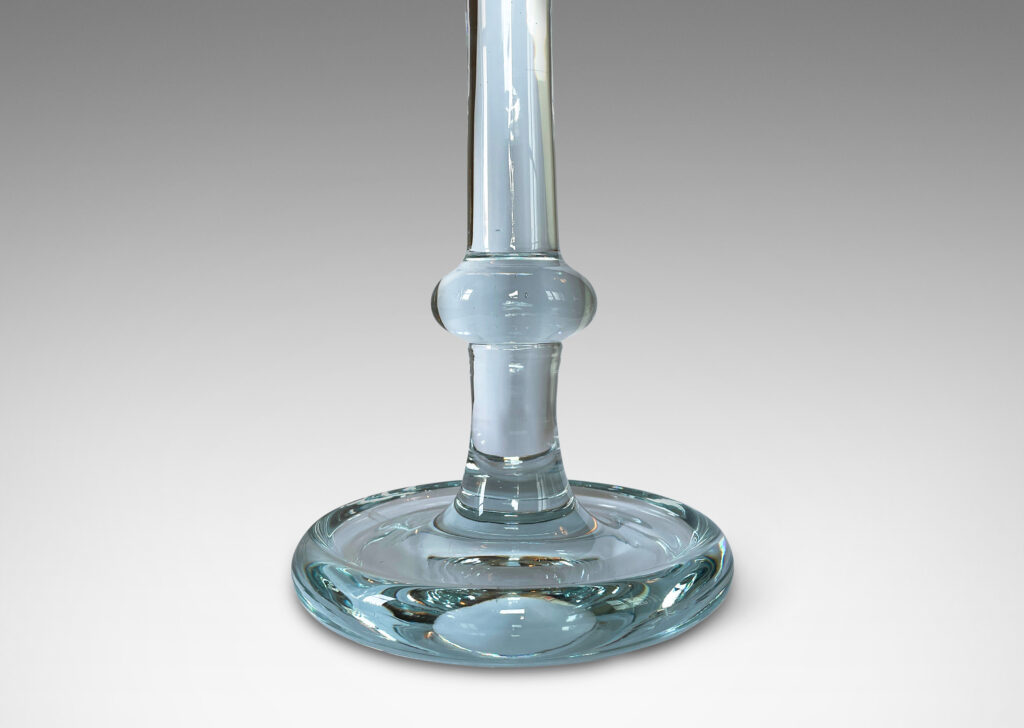 Gallery BAC having stands with engaged fobs and disk bases; hand-formed clear crystal