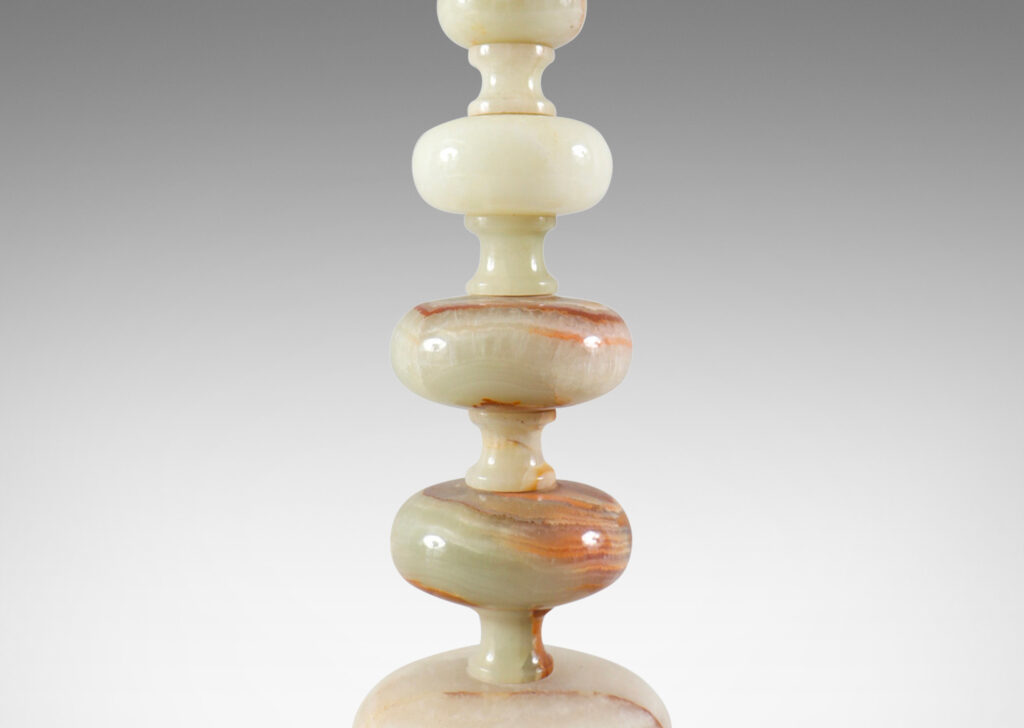 Gallery BAC tiered knob forms in ivory, green and rust tones; lathed onyx