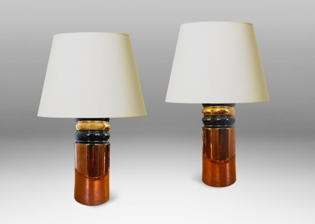 Gallery BAC cylindrical forms with scalloped top, glazed in a rich high luster copper, gold and black;