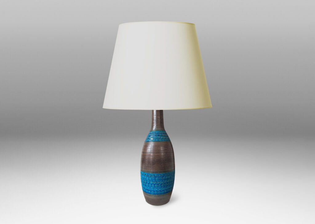 Gallery BAC tall ovoid body and long neck in a cool brown, with bands of impressed geometric patterns in a saturated cerulean blue