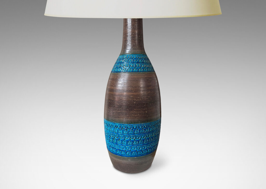 Gallery BAC tall ovoid body and long neck in a cool brown, with bands of impressed geometric patterns in a saturated cerulean blue