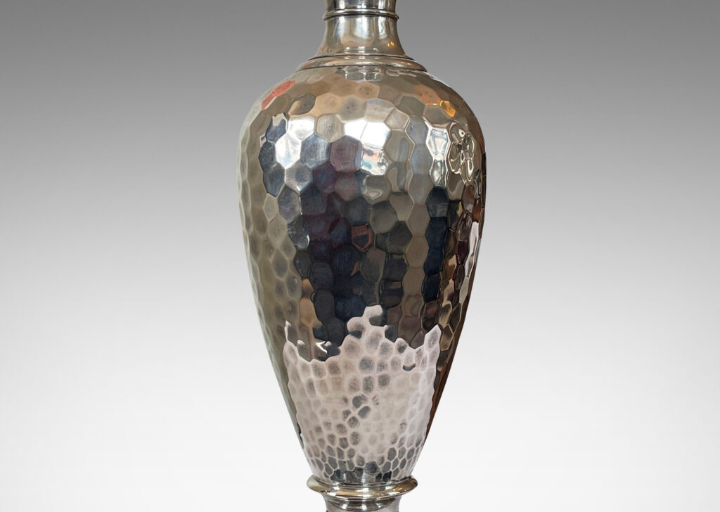 Gallery BAC tapered vase form with a beautifully executed hammered texture; sterling silver with ebonized wood base