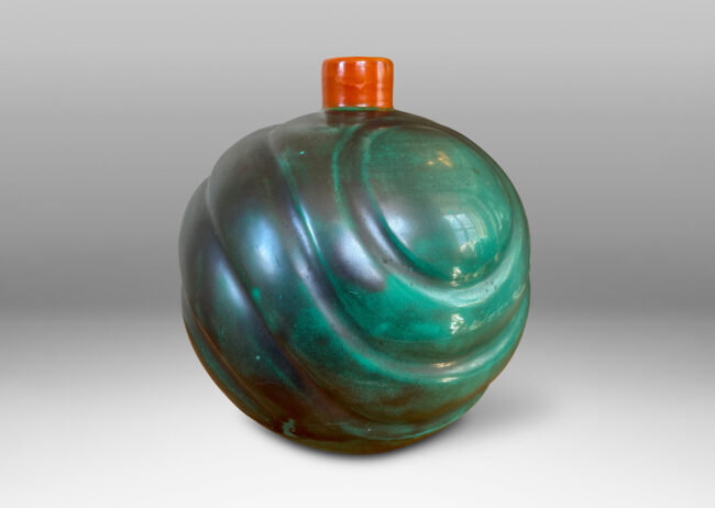 Gallery BAC tapering globe form with diagonal concentric lobes glazed in tonal teal green with persimmon orange