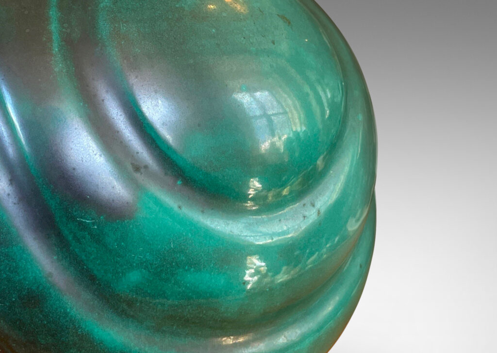 Gallery BAC tapering globe form with diagonal concentric lobes glazed in tonal teal green with persimmon orange