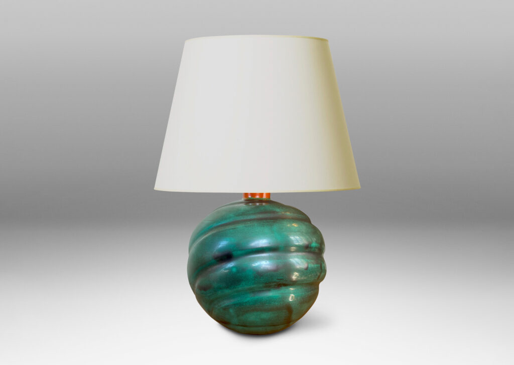 Gallery BAC tapering globe form with diagonal concentric lobes glazed in tonal teal green with persimmon orange