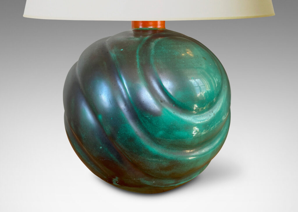 Gallery BAC tapering globe form with diagonal concentric lobes glazed in tonal teal green with persimmon orange