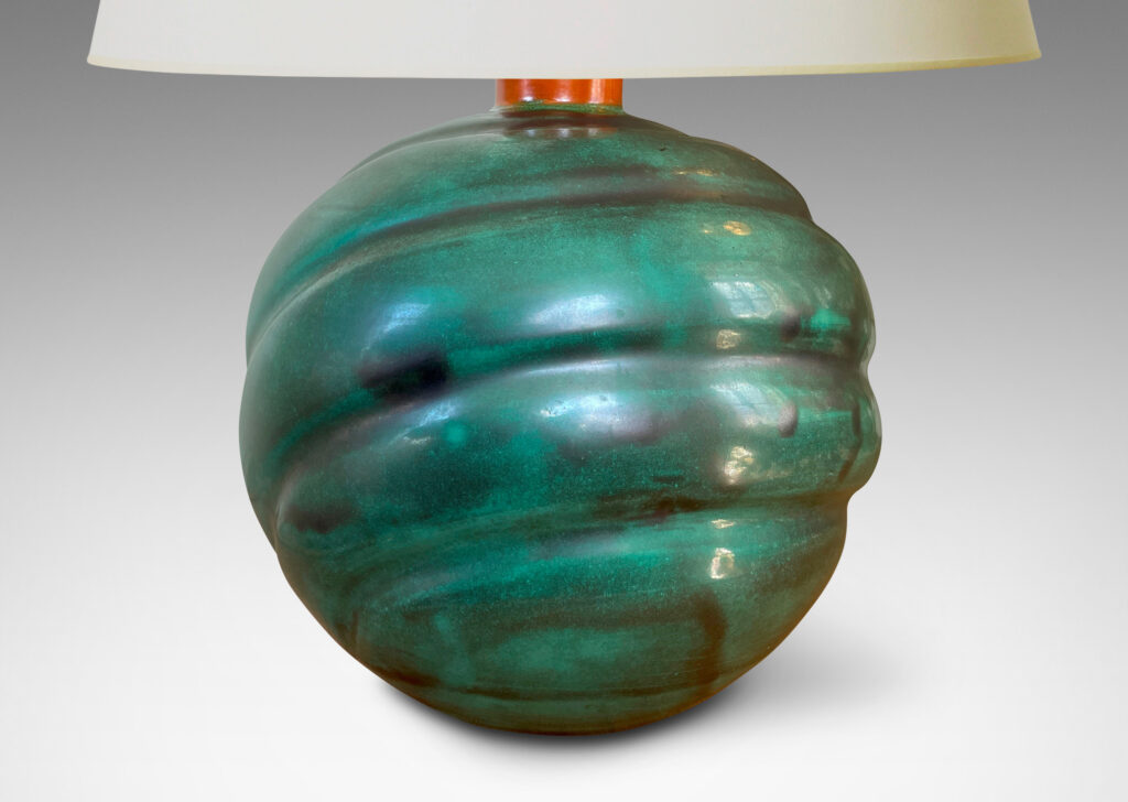 Gallery BAC tapering globe form with diagonal concentric lobes glazed in tonal teal green with persimmon orange