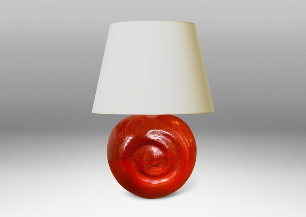 Gallery BAC globe form with relief spirals on two side in rich persimmon orange glaze