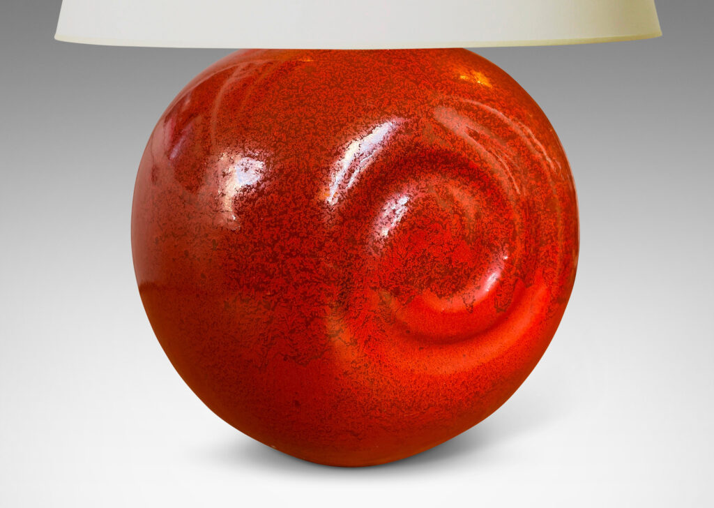 Gallery BAC globe form with relief spirals on two side in rich persimmon orange glaze