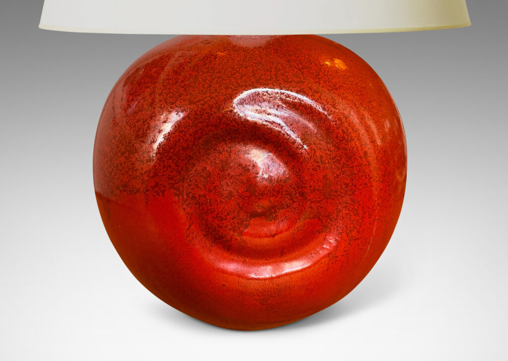 Gallery BAC globe form with relief spirals on two side in rich persimmon orange glaze