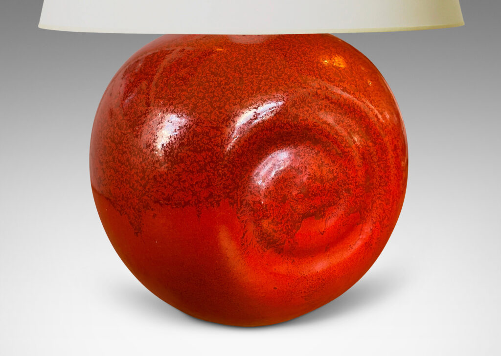 Gallery BAC globe form with relief spirals on two side in rich persimmon orange glaze