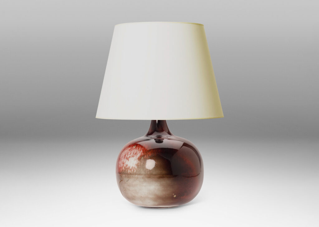 Gallery BAC plump globe form with sprouting neck, glazed in oxblood burgundy