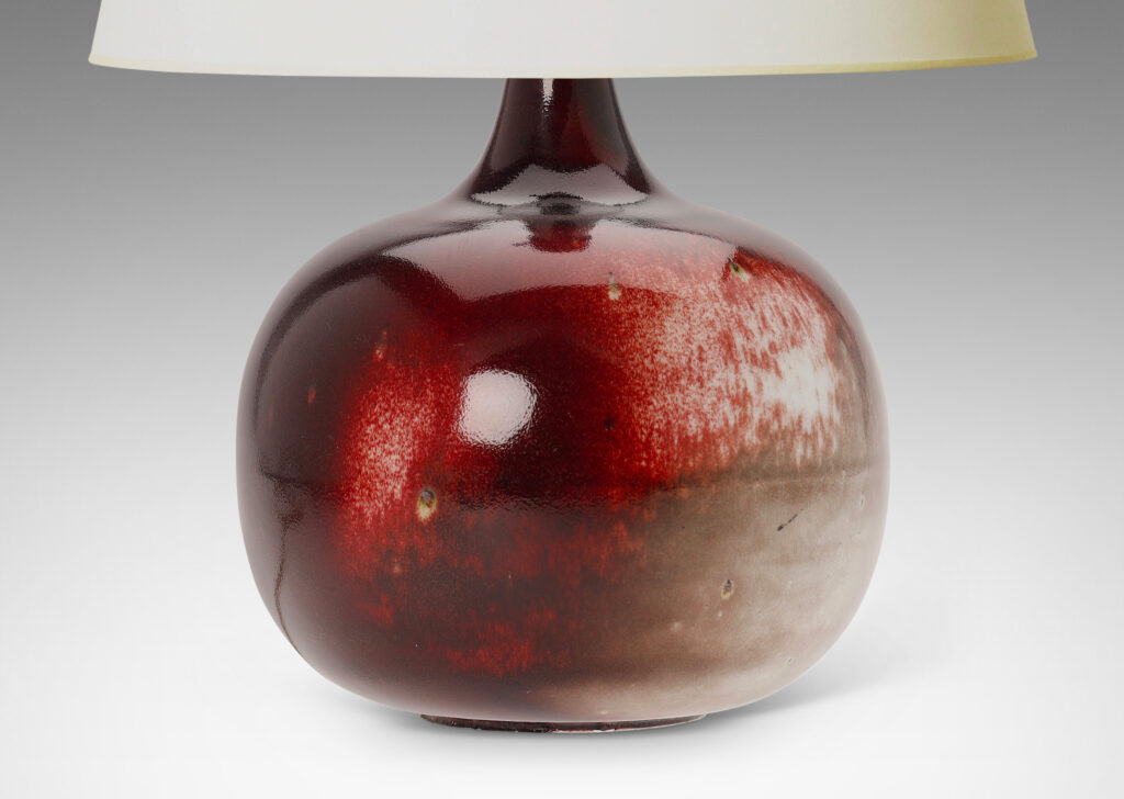 Gallery BAC plump globe form with sprouting neck, glazed in oxblood burgundy