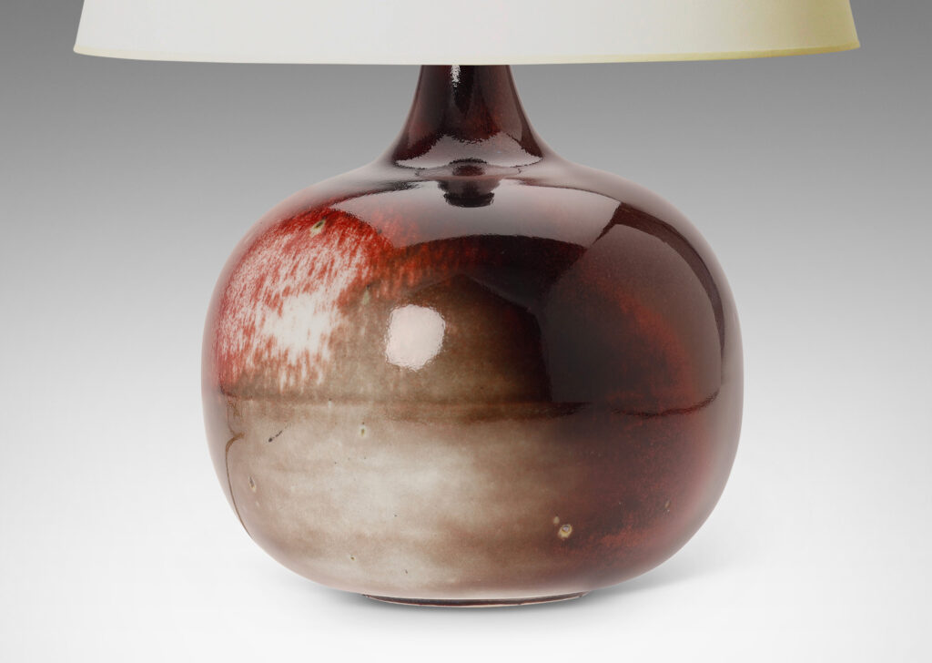 Gallery BAC plump globe form with sprouting neck, glazed in oxblood burgundy