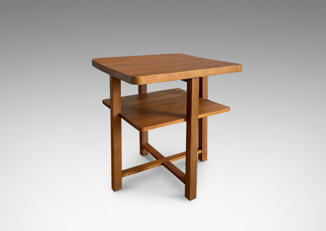 Gallery BAC central legs supporting a square top, floating shelf, and stretchers; solid pine