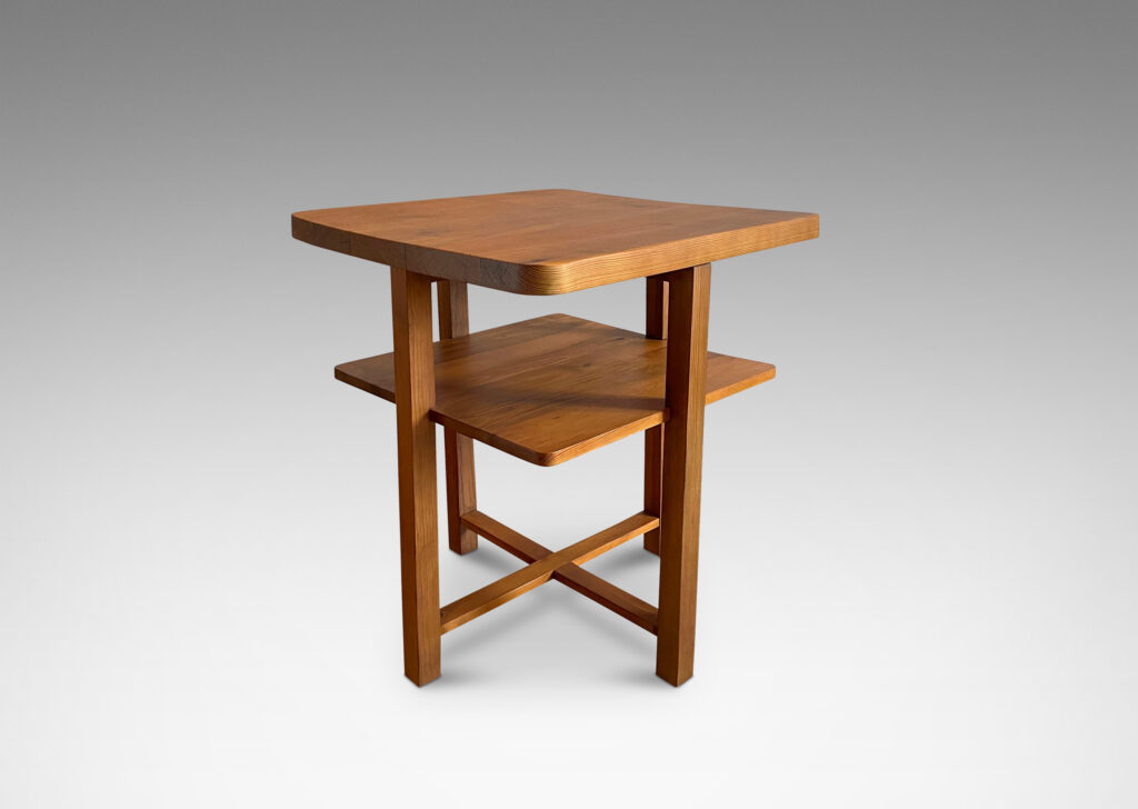 Gallery BAC central legs supporting a square top, floating shelf, and stretchers; solid pine