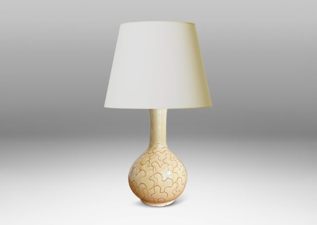 Gallery BAC decanter form with tall neck, glazed in a gloss ivory-cream and decorated with a sgraffito leaf pattern