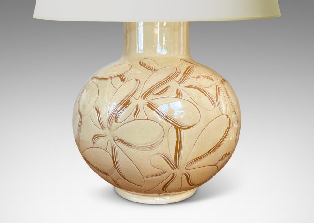 Gallery BAC globe form with wide neck, glazed in a gloss ivory and decorated with a sgraffito floral pattern