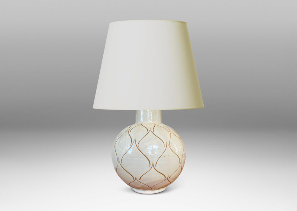 Gallery BAC globe form with wide neck glazed in a gloss ivory and decorated with a sgraffito ogival/leaf pattern