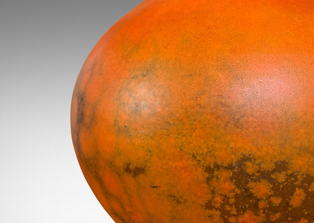 Gallery BAC plump globe form, glazed in a matte orange and port/brown