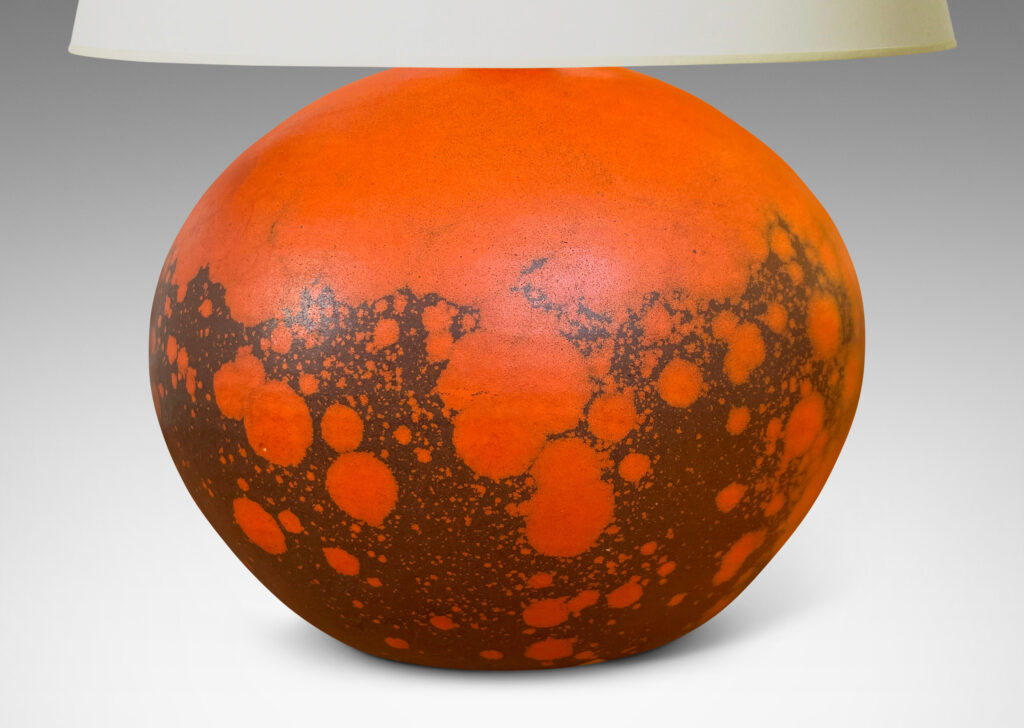 Gallery BAC plump globe form, glazed in a matte orange and port/brown