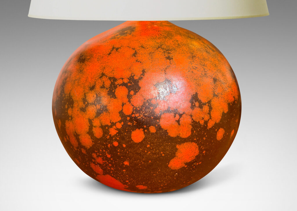 Gallery BAC plump globe form, glazed in a matte orange and port/brown