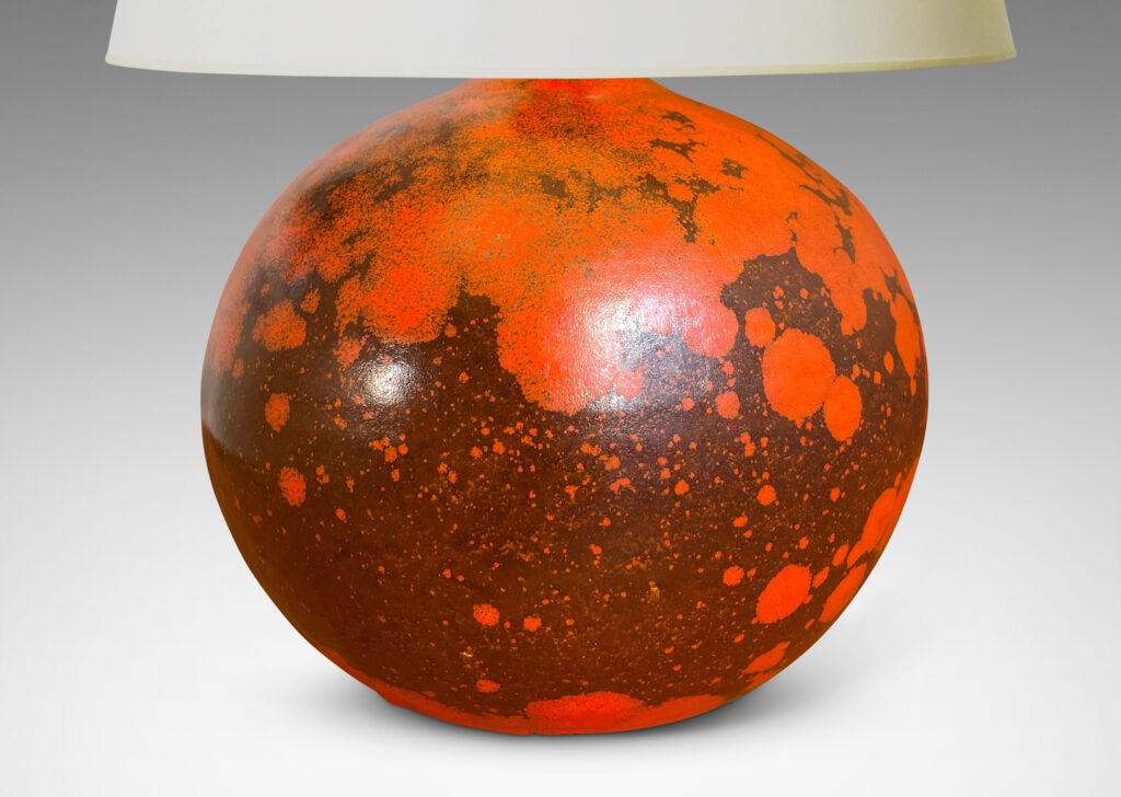 Gallery BAC plump globe form, glazed in a matte orange and port/brown