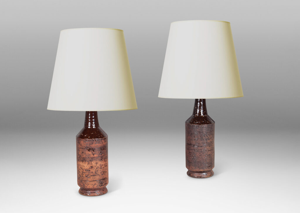 Gallery BAC cylindrical form with textured surface in matte brown tones evoking cork, with necks in gloss brown