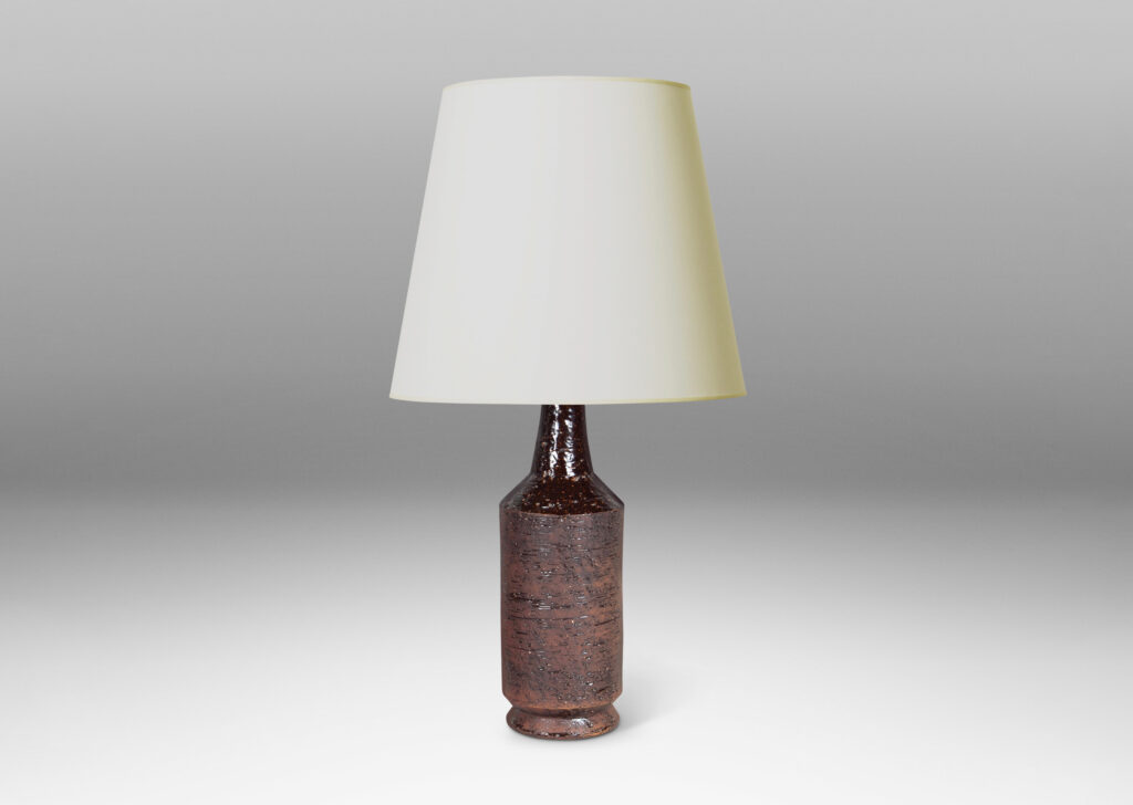 Gallery BAC cylindrical form with textured surface in matte brown tones evoking cork, with necks in gloss brown