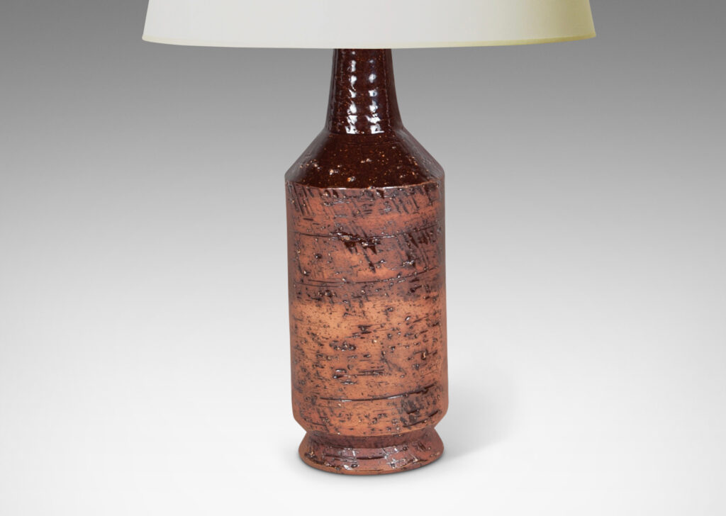 Gallery BAC cylindrical form with textured surface in matte brown tones evoking cork, with necks in gloss brown