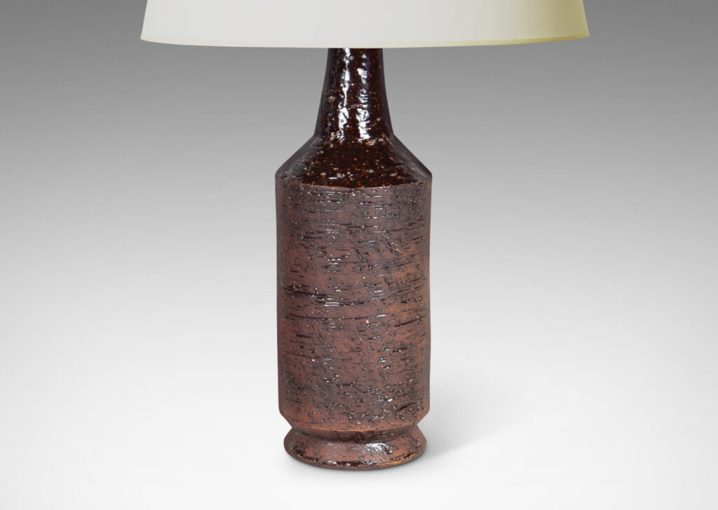 Gallery BAC cylindrical form with textured surface in matte brown tones evoking cork, with necks in gloss brown