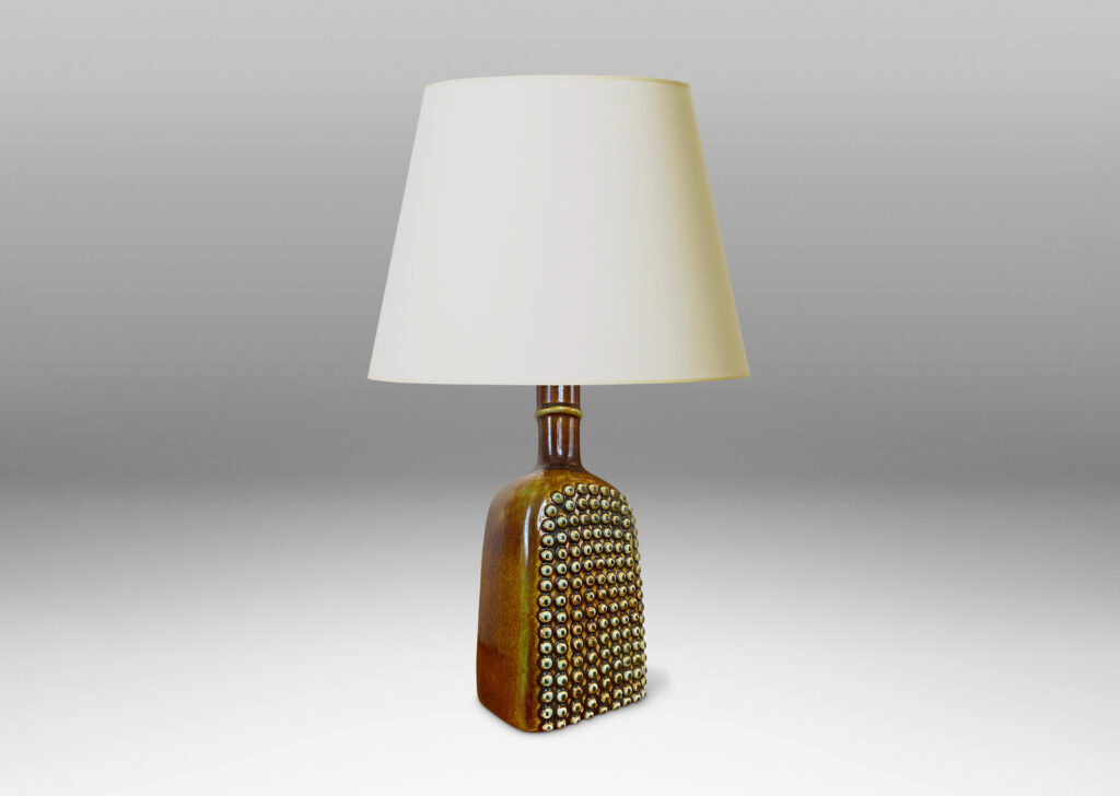 Gallery BAC squared bottle-like form with a grid of cleats on two sides in a raw umber brown glaze