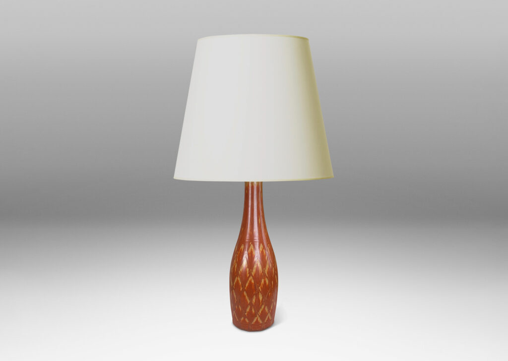 Gallery BAC tall bottle forms with carved diamond pattern, and glazed in terra-cotta/tan