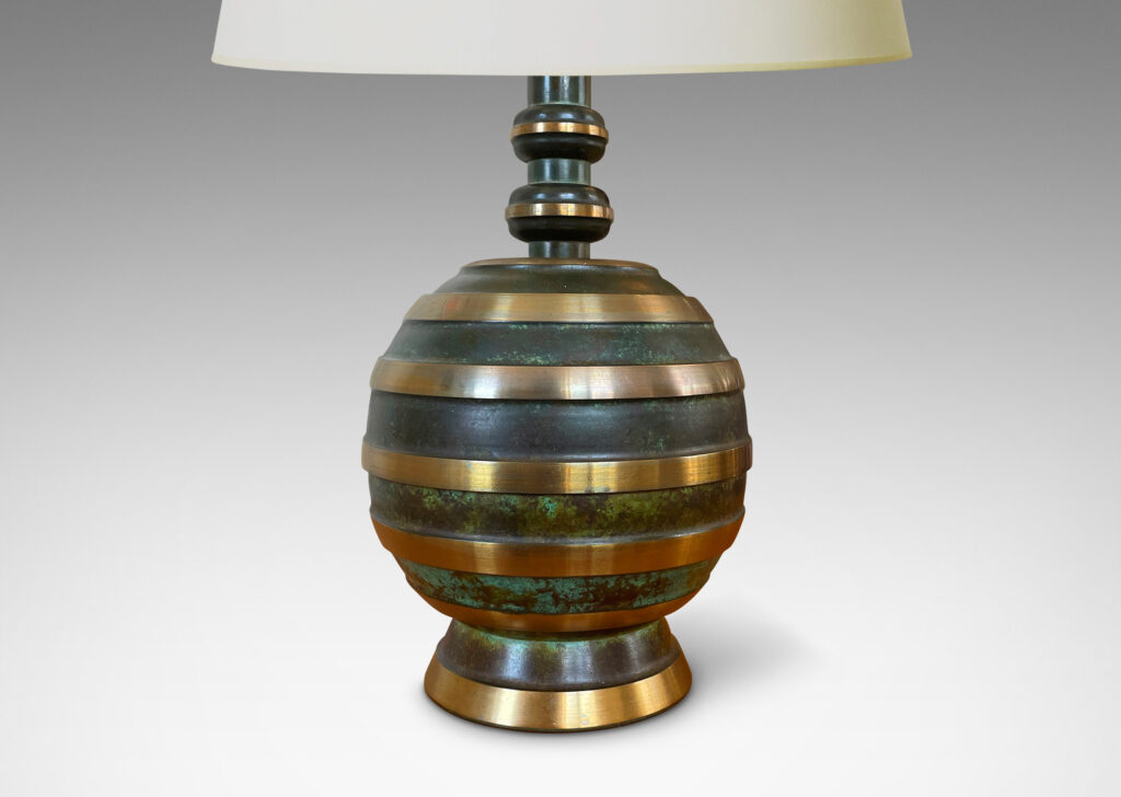 Gallery BAC spherical forms with raised horizontal polished bronze bands alternating with recessed verdigris patinated bands