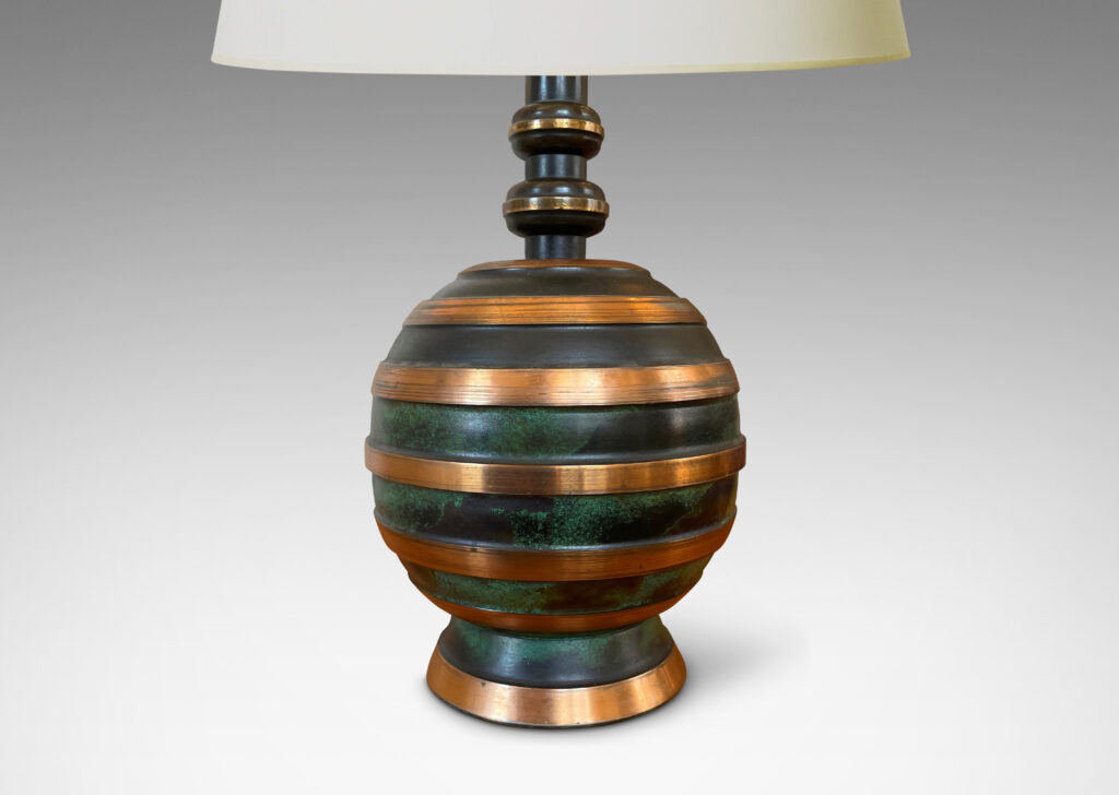 Gallery BAC spherical forms with raised horizontal polished bronze bands alternating with recessed verdigris patinated bands